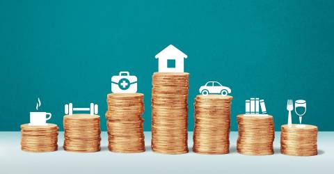Betalen, verschillende icoontjes op een stapel munten
